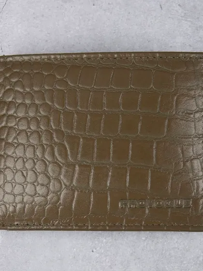A closed, front-facing shot of the olive green crocodile wallet.