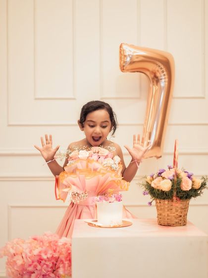 The pure surprise and excitement of a 7th birthday. We capture those candid, expressive moments that truly tell the story of the celebration.