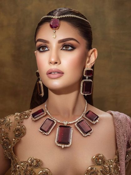 A final close up of this breathtaking editorial look. The makeup is as much a star as the jewelry.