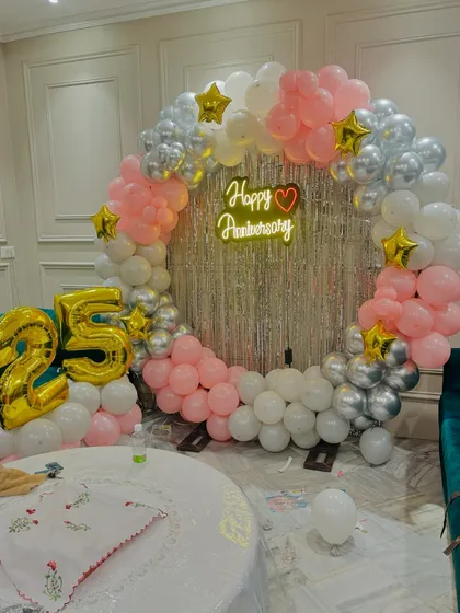 Another angle of the elegant 25th-anniversary party decoration.