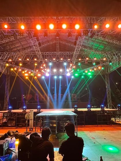 The empty 'Alive India' stage, fully lit and ready for the show. This highlights the complexity and beauty of the lighting design our structures support.