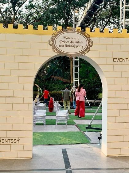 The grand entrance to the royal birthday party, designed as a castle gate. This immersive entrance makes guests feel like they are stepping into a different world from the moment they arrive.