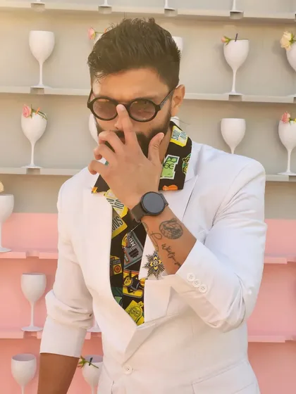 A closer, more mysterious shot of the white blazer look, playing with angles and expressions.