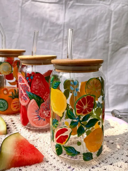 A collection of our fruity summer sippers, each one bursting with color and hand-painted details.