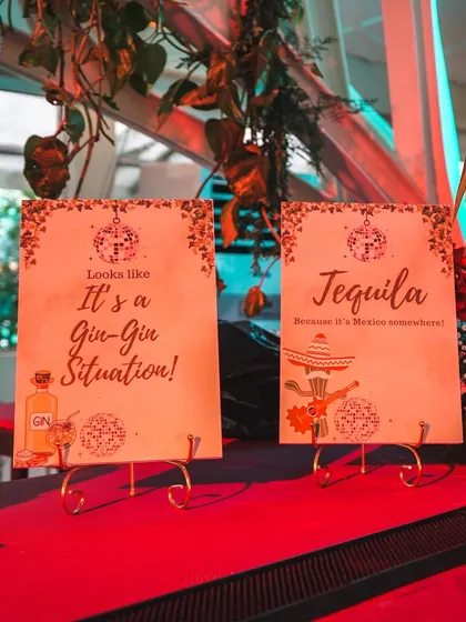 Custom signage is key to a great guest experience. These fun, thematic signs at the "Jungle Disco" bar added a playful touch and guided guests through the drink offerings.