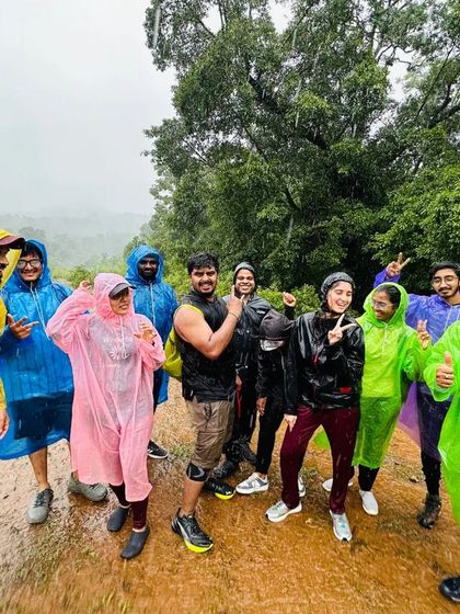 Another fun group shot in the rain, showing that a little downpour can't stop our adventurous spirit.