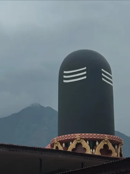 A massive Shiva Lingam against the backdrop of the Himalayan peaks. This powerful symbol of divine energy is a constant presence, reminding us of the transformative potential within and around us.