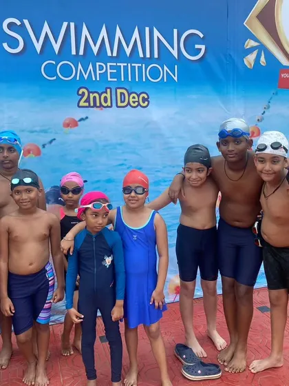 Our team ready to compete. Before the race, we focus on strategy and mindset. In swimming, preparation is just as important as the performance itself.