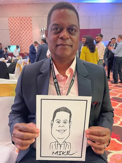 Drawing an international guest at a large scale event in BKC, Mumbai. My art transcends language and always brings a smile.