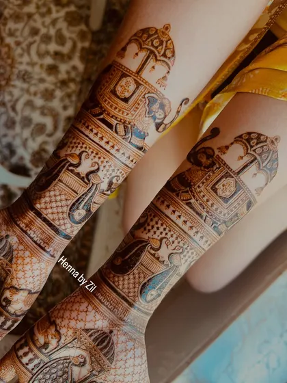 This design features bands of decorated elephants and peacocks, creating a story-like procession up the arms. The detail is just stunning.
