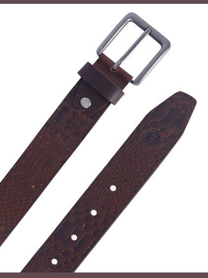 A close-up of the textured leather and buckle.