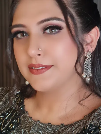 A stunning portrait of Diksha. Her makeup is flawless, and she looks ready for any special occasion.