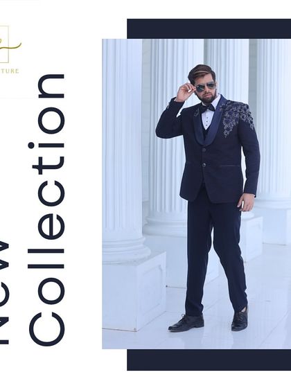 A navy blue tuxedo with stunning shoulder embroidery, a unique piece for a fashion-forward groom.