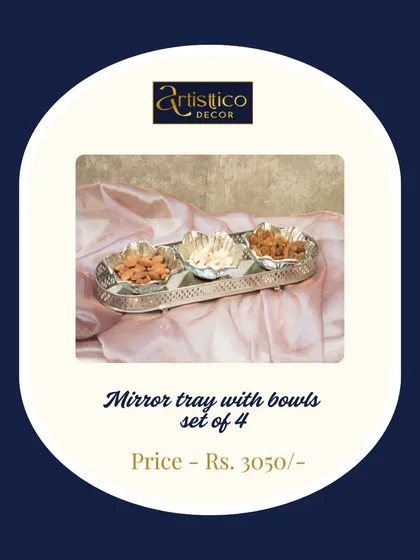 A mirror tray set with four matching bowls. This is a complete serving solution for dry fruits or other small snacks, presented with elegance and style.