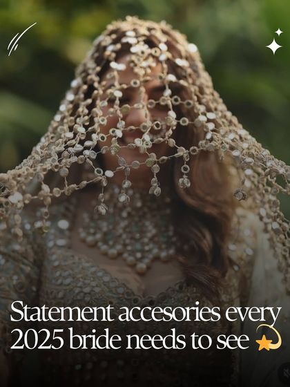 Statement accessories are a must for the 2025 bride. This image, featuring a stunning mirror work veil, introduces the idea of going bold and unapologetic with your choices.