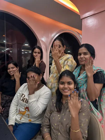 The best part of teaching is seeing the joy and confidence in my students. Here, a happy group from our 7-week pro batch shows off their newly created nail art.
