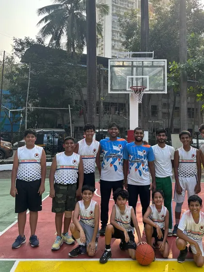 A team photo with our coaches and junior players, united and ready to compete.