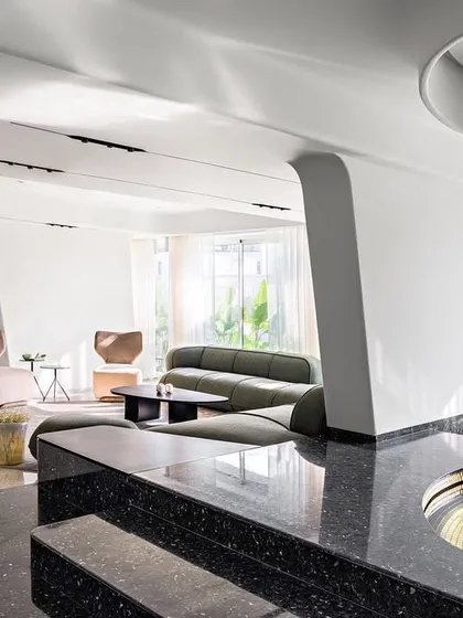 For Apartment 56 in South Mumbai, we aimed to merge art and interiors into a gallery-like living space. The design focuses on horizontality and expansiveness, with fluid forms and a reflective pool creating a seamless, experiential atmosphere that connects to nature.