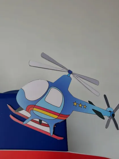 Every detail matters, like this charming helicopter cutout that adds another layer of fun to the aviation-themed birthday gift.