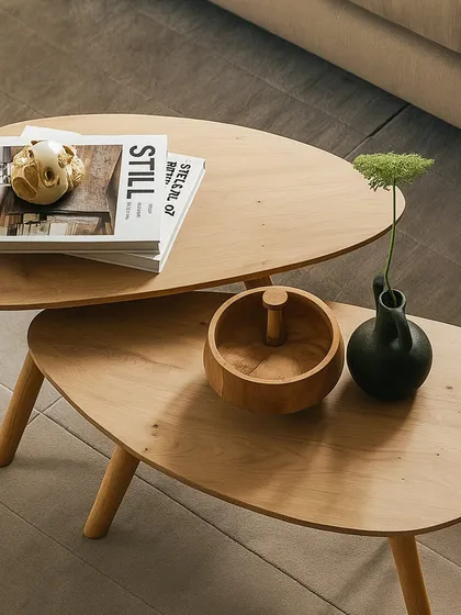 This nested set of coffee tables showcases my focus on minimalist design and natural materials. Crafted from solid oak, their simple, curved forms bring a sense of calm and sophistication to any modern living room.