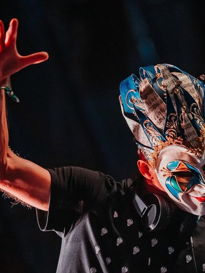 I bring unique and mysterious artists like Boris Brejcha, known for his signature joker mask. This close-up shot captures the enigmatic persona that adds to the allure of his high-tech minimal sets.