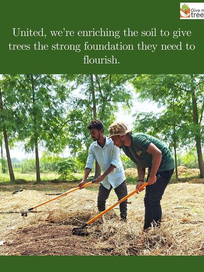 United in purpose. Two of our team members work in tandem to enrich the soil, giving the trees the strong foundation they need to grow tall and healthy.