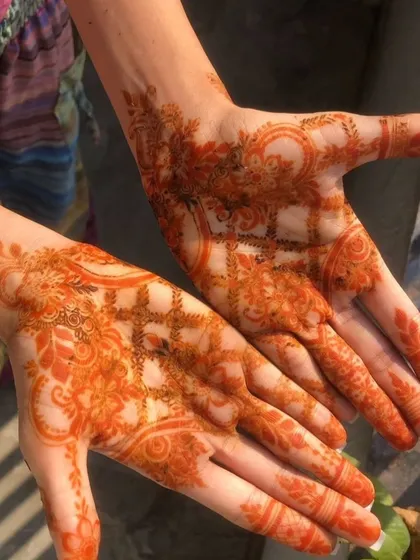 Look at that fresh, vibrant orange stain! This is the first stage of my organic mehendi working its magic. This beautiful color is the sign of a pure, chemical-free paste that will darken into a rich brown.