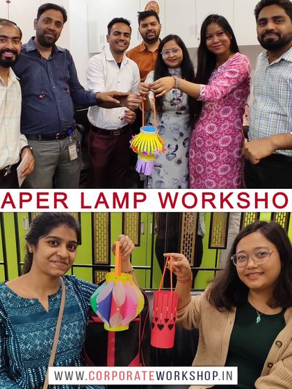 A team from a corporate workshop proudly displaying the colorful paper lamps they created. This is a great team-building activity that results in a beautiful, functional piece of decor.