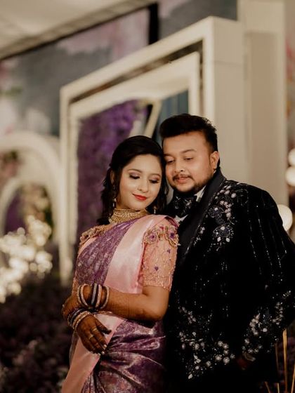 A romantic embrace between the couple at their glamorous reception.