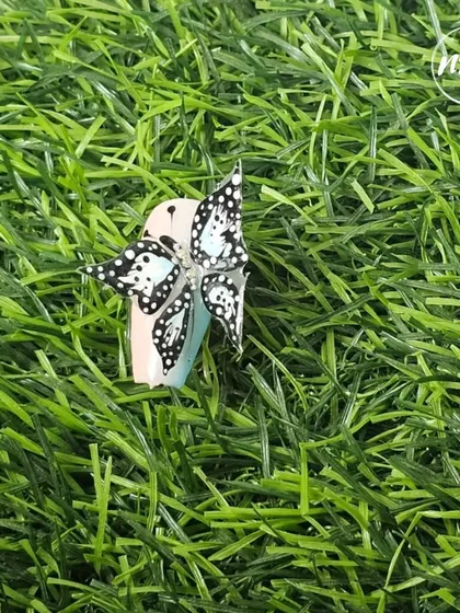Another angle of the stunning 5D butterfly, showcasing its delicate structure and detail. This is a true statement piece of nail art.