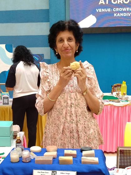 My mother helping me out at a stall. She's one of the incredible women who inspire me every day.