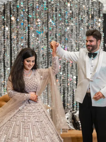 The couple shares a dance after their engagement, a moment of pure happiness and celebration.