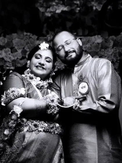 A timeless black and white portrait of a couple at their baby shower. This style brings a different emotion, focusing purely on their expressions and connection.