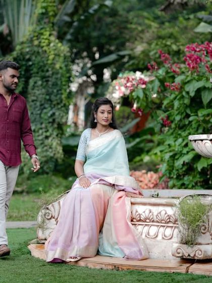 A serene moment by the garden fountain, a classic and elegant backdrop.