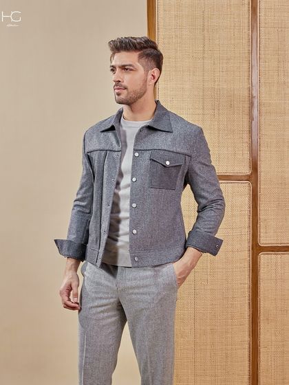 Monochrome, but never boring. This grey shacket with contrasting pocket details adds a playful edge to an understated look, making it perfect for the airport, an after-party, or dinner.
