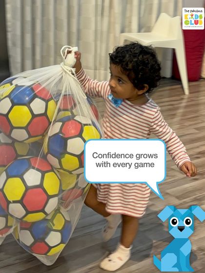 Confidence grows with every game. This little one is tackling a big task with determination, a perfect example of how play builds a "can-do" attitude.