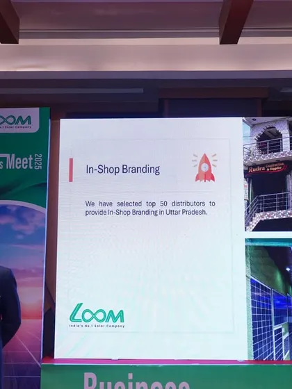 A presentation during the dealer meet, highlighting our support for in-shop branding for our top distributors in Uttar Pradesh.