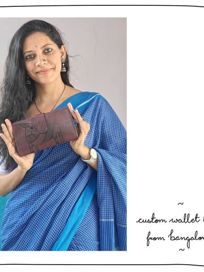 Anita from Bangalore with her custom wallet in Gond Mulberry. The intricate Gond art owl looks stunning on the deep purple leather.