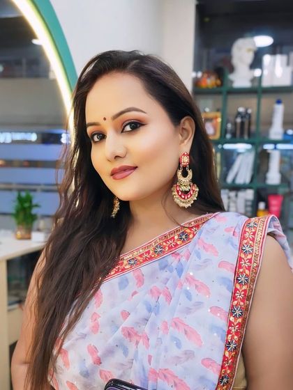 A bright and clear shot of the party makeup, showing the flawless base and soft eye makeup.