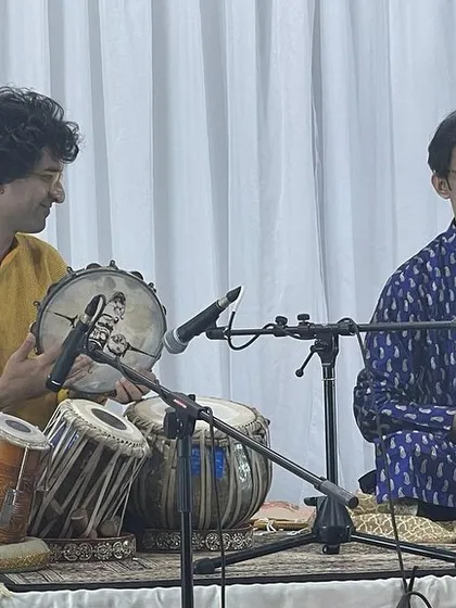 Sharing the stage with Sounak da during our US tour. In this picture, I am also playing the Kanjira, adding a different rhythmic texture to his vocal performance.