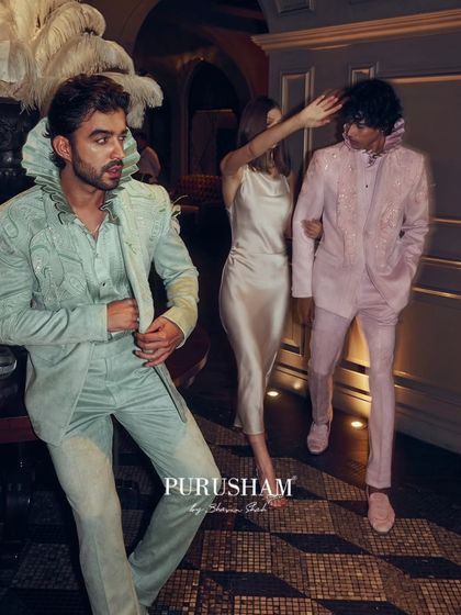 An entrance in pastel. This image showcases two looks from the collection, one in soft mint and the other in blush pink, both featuring my signature embroidery and dramatic collars. It proves that after-hours style can be both soft and powerful.