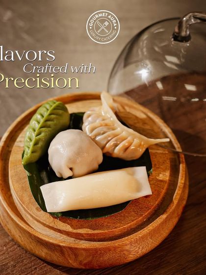"Flavors Crafted with Precision." An assortment of delicate dumplings, showcasing the meticulous detail and artistry in our food.