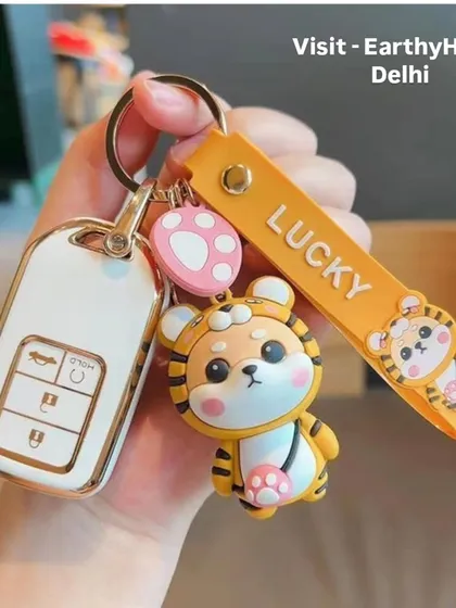 Accessorize your keys with this lucky tiger keychain. It comes with a comfortable wrist strap and is perfect for car keys or house keys.