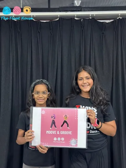 Two friends celebrating their love for dance. Our studio is a community space where friendships are built through shared passions.
