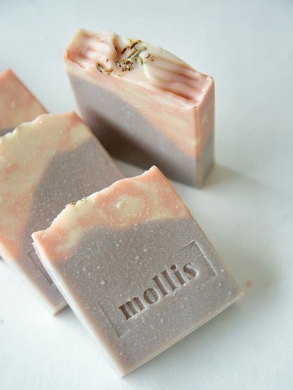 A close-up of the stamped Lavender Patchouli soap, a customer favorite.