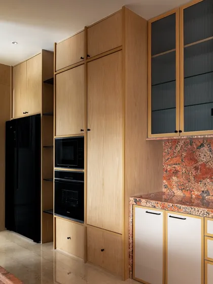 The 'ARAH' kitchen, featured in India Design World, with its bold marble and light wood cabinetry.