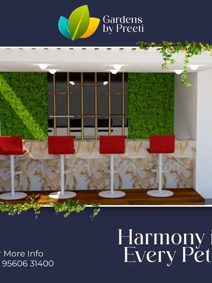 This render shows a modern bar or pantry area with a marble counter and bold red stools, set against a backdrop of vertical green walls that add a touch of nature and vibrancy.
