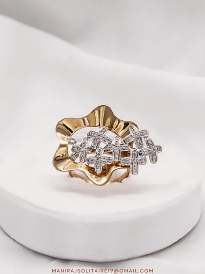 This unique ring features a cluster of small, diamond-studded crosses on a beautifully sculpted gold band. It's a piece with both style and meaning.