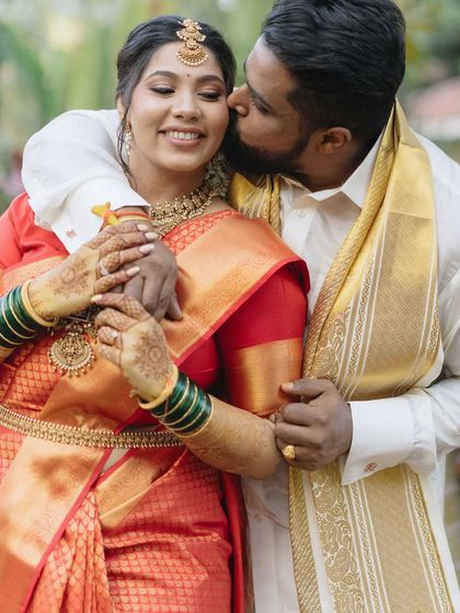 A gentle kiss and a happy smile. This close-up portrait of Gayatri and Akash is filled with the warmth and tenderness of their love story, which began with a chance encounter at the gym.