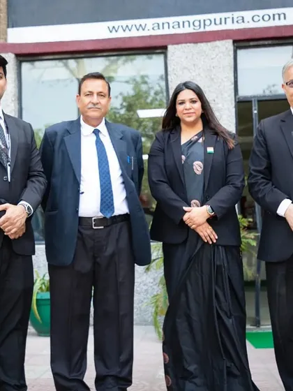 A formal photograph with the esteemed faculty and judges at the B.S. Anangpuria Institute of Law. These collaborations are vital for maintaining high standards in legal education.